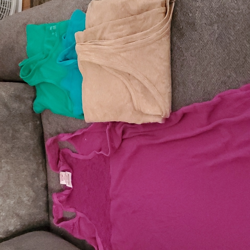 4 tank tops used, beige is new.
